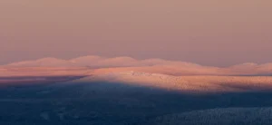Sunset view of a corporate event in the snow-covered mountains