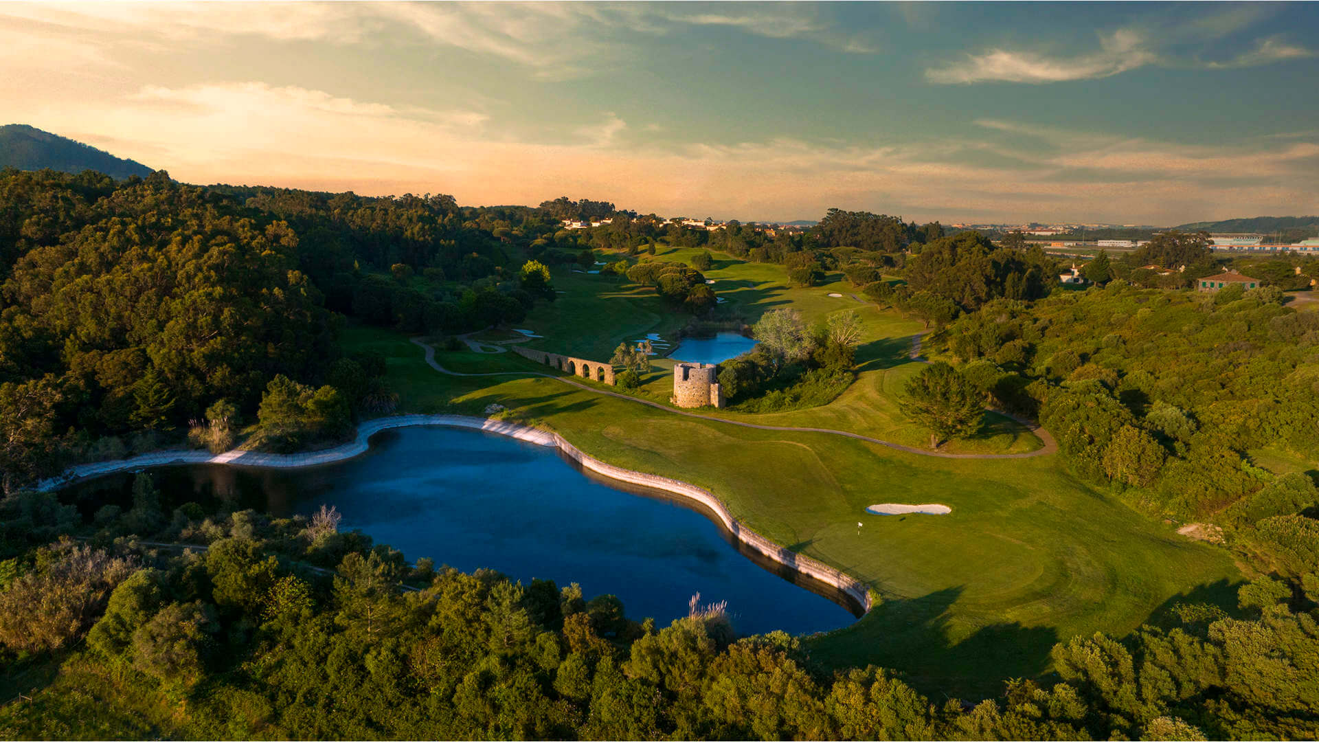 Luxury golf resort venue in Cascais featuring scenic landscapes, lakes, and premium outdoor space for corporate events